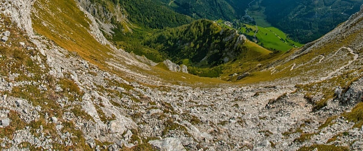 September 2016
Seewiesen, Hochschwab, Steiermark, Austria 
This is the view from Afflenzer Staritzen towards Seewiesen village and Seegraben valley.  Afflenzer Staritzen range is part of the Hochschwab range in Austria and rise up to 2.000 m altitude. Seewiesen is a tiny village (alt. 974 meters) on the east end of Hochschwab and it is an ideal starting or ending point for hiking in the Hochschwab mountains.