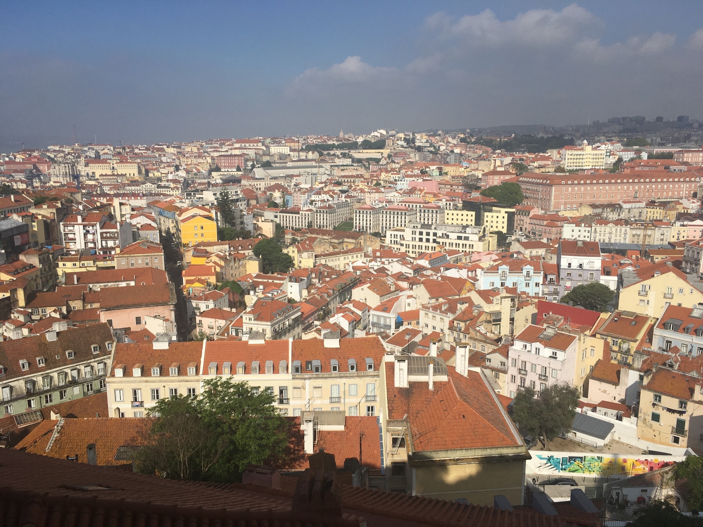 The city wakes up from the Friday night parties. From Miradouro da Graça, right next to the beautiful church, we can see the rooftops of the city waiting to be discovered. #Lisbon #Portugal 