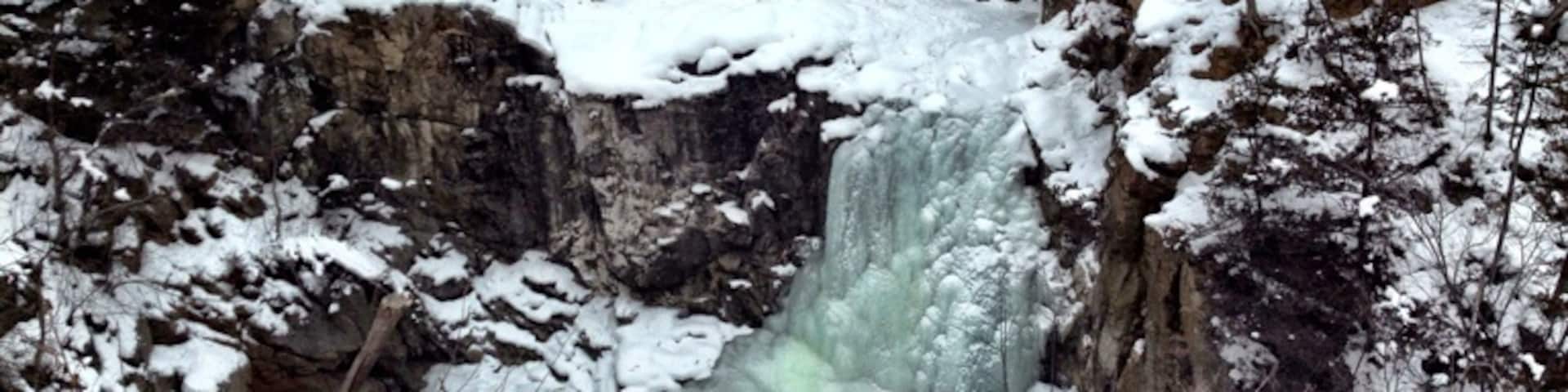 A wintery trek to see Ramsey Falls now sculpted in ice, the trickle of water can still be heard from behind. #snow