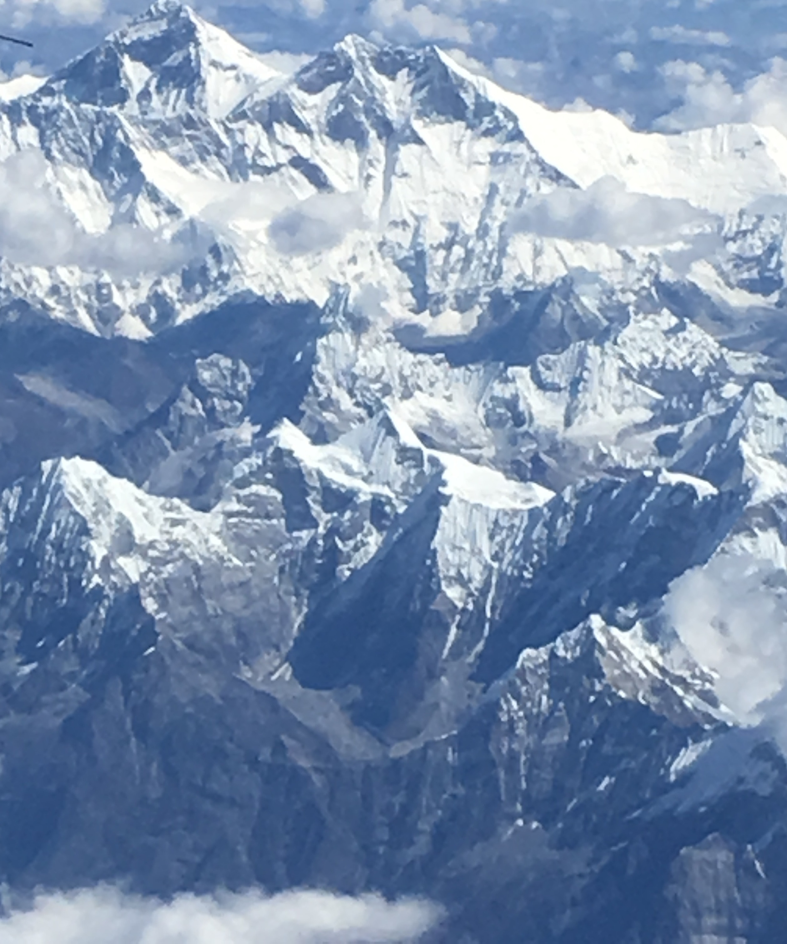 A great view of the mighty Mt. Everest can be taken from flight to Paro, Bhutan from New Delhi or Kathmandu.

Pro Tip- Please make sure you are sitting at the right side of the plane to get the clear view of the Himalayan ranges. 
When you fly into Bhutan its on the left window side while flying out of Bhutan its of course the right window side.
#AboveItAll