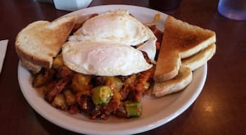 Walker Hash - Two eggs, chorizo sausage, andouille sausage, okra, cheddar cheese and Cajun home fries 