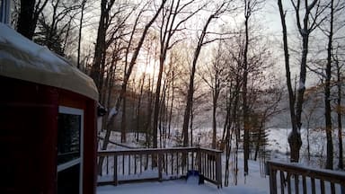 Morning sunshine on the deck of the Taylor Lake yurt in Gatineau Park. We spent the night in this beautiful, cozy yurt when temperatures were reading -29 (that's before the wind chill!). #snow 