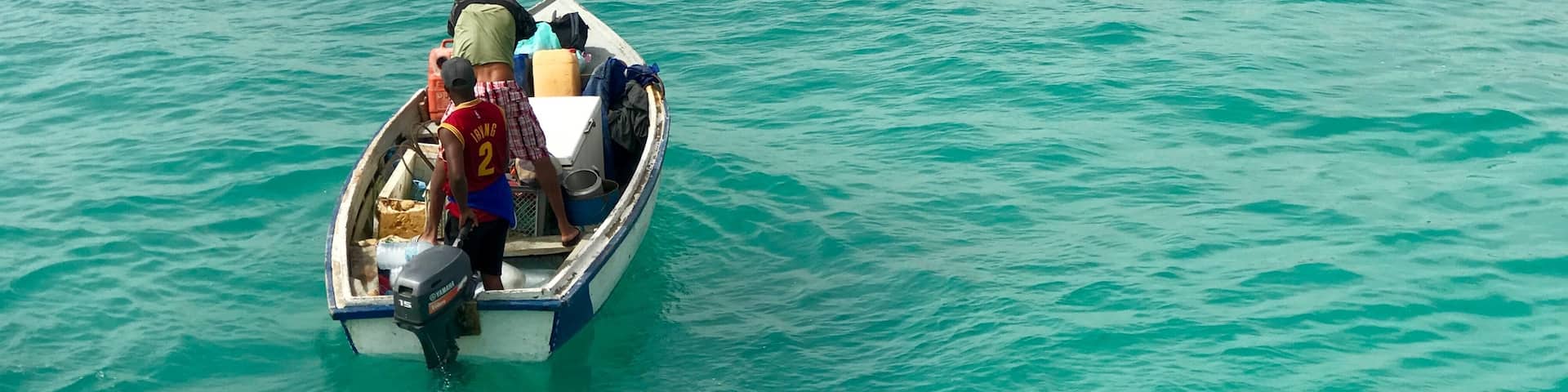 Local fisherman returning with the day’s catch, off Santa Maria pier in Sal, Cape Verde. A bustling fish market run directly from the pier! #caboverde