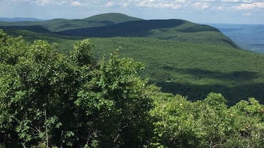 This is photo of the Bear Mountain summit from Mount Riga summit while hiking Appalachian Trail CT/MA section.