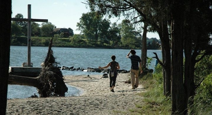 Known largely for midnight bonfires, guitar circles and skinnydipping, The Point is also great for sunbathing and wading. 

Available for a limited time only - the sand is eroding away. 