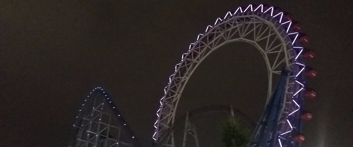 Amusement park in the centre of Tokyo where you can ride the giant Thunder Dolphin roller coaster through a skyscrapper and a ferris wheel.  Lots of other good rides and attractions including a horror walk though based on The Ring. Plenty of restaurants and a shopping complex nearby.