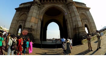 The Gateway of India in Mumbai. Built by the British Raj to commemorate the arrival of King George V and Queen Mary, construction began in 1911 and finished in 1924.

This area is flooded with tourists, both local and foreign. Thankfully, the structure is so big that it can be seen well the throngs of tourists. You'll also find lots of locals trying sell you all sorts of oddities including kids toys and massive balloons.

#architecture