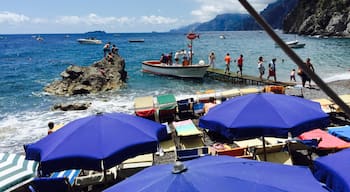 Laid back beach club and restaurant accessible by water taxi from positano.  Nice swimming for kids.  One of the best lunches I've ever had: mussel soup, homemade spaghetti with pesto, marinated anchovies.  And don't forget the chilled peach  wine!  Come for a great day. 