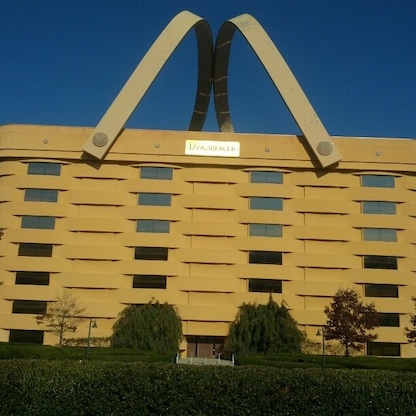 A six story office building shaped like a giant overpriced Longaberger wicker basket.