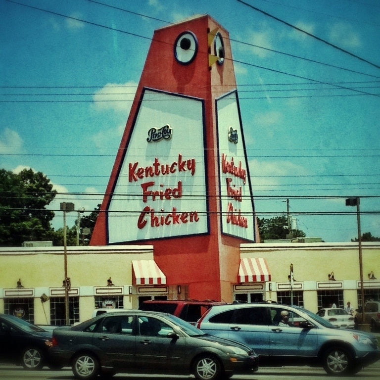The big chicken. Something that is featured in the "weird Georgia" book. It was built in the 1960s' by the owner, and is a great drive by "we saw that" thing to see. 
 
What is it? Why, it's a giant chicken, 56 feet tall, built in front of a KFC in Marietta.

Why is it there? I have no idea.

Anything special? It's a giant chicken, that moves! On the side of the road, and you can also get lunch.
