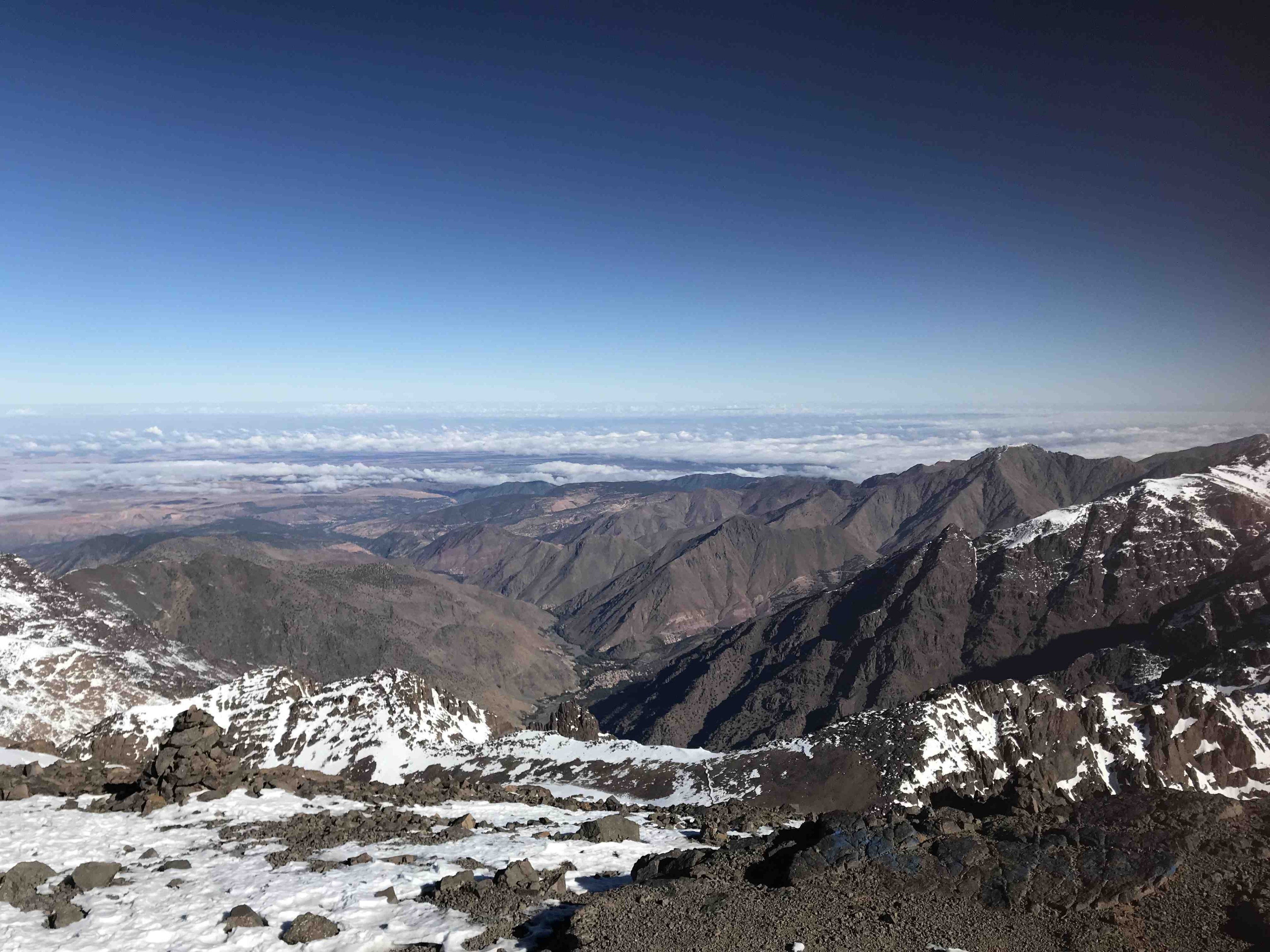 Amazing view from Toubkal. A little bit windy but sun was present :-) such a nice feeling of accomplishment !! #lifeatexpedia