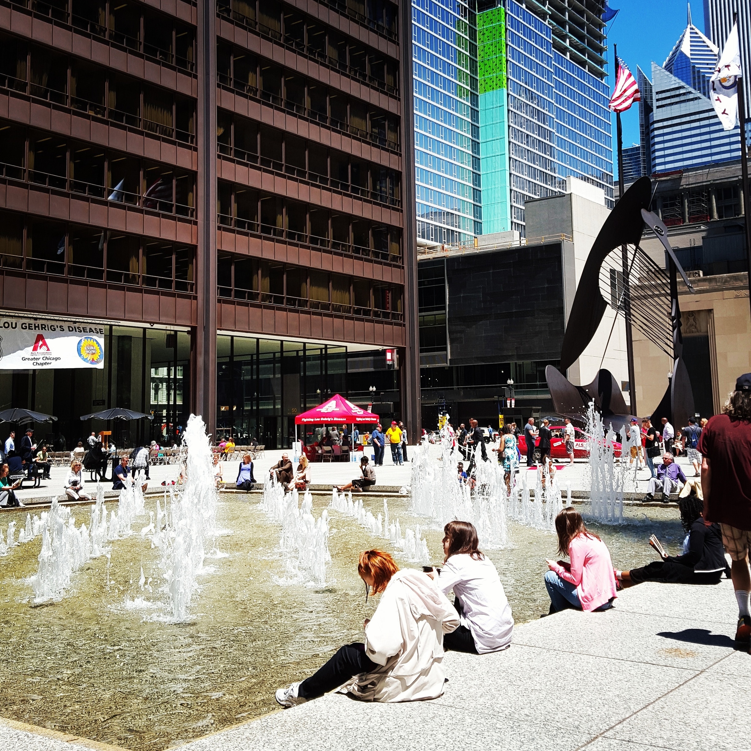 Is it a hot summer day in Chicago and you want to see some locals being local? Then look no further than Daley Plaza. There is always something happening on the plaza from rallies to food vendor days. It is also a nice place to people watch.