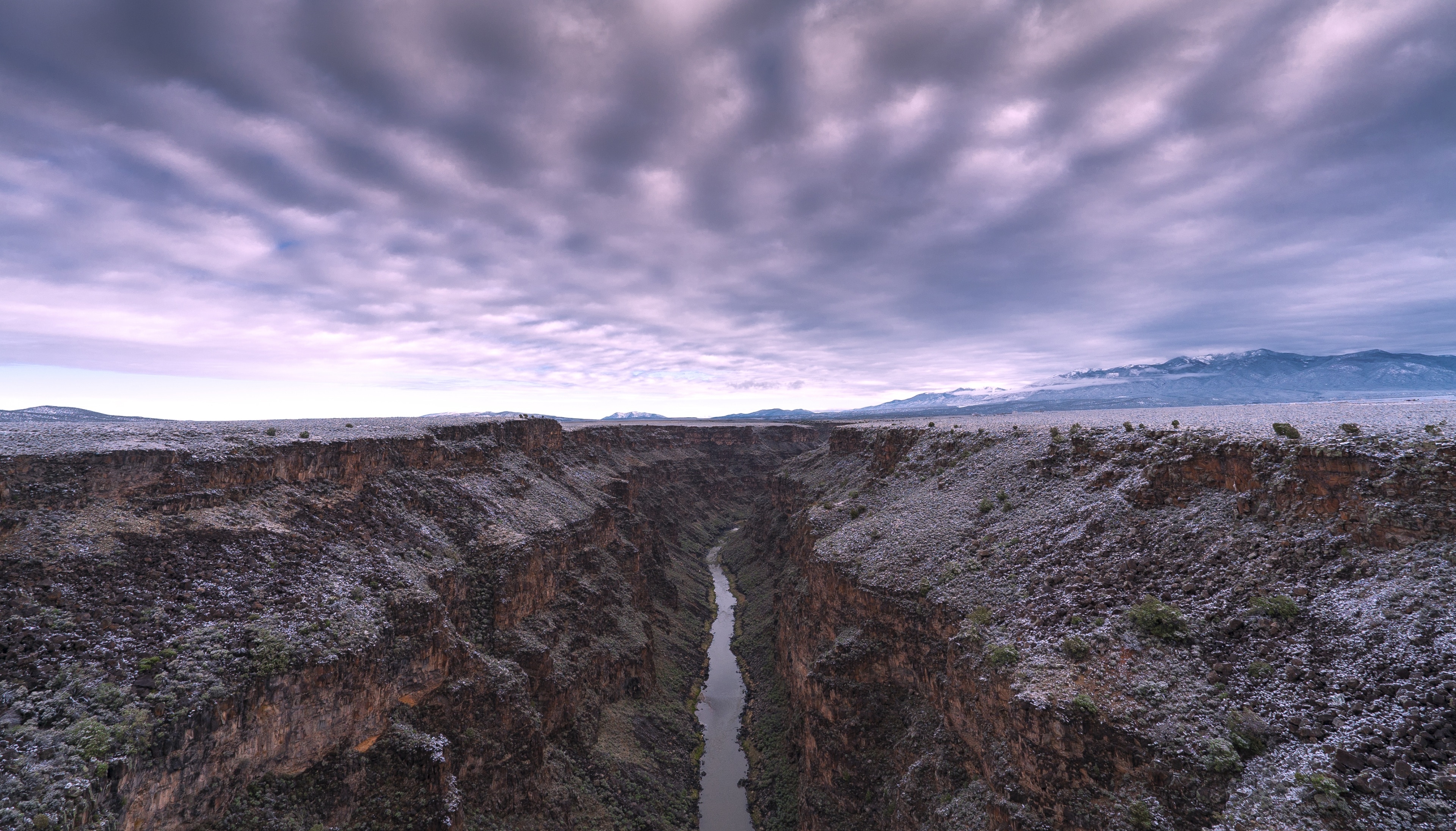 Just outside of Taos, New Mexico sits the Rio Grande Gorge. The bridge stands a staggering 656' above a seemingly small ribbon of water below. Walkways on either side provide incredible views up and down the gorge. #ADVENTURE