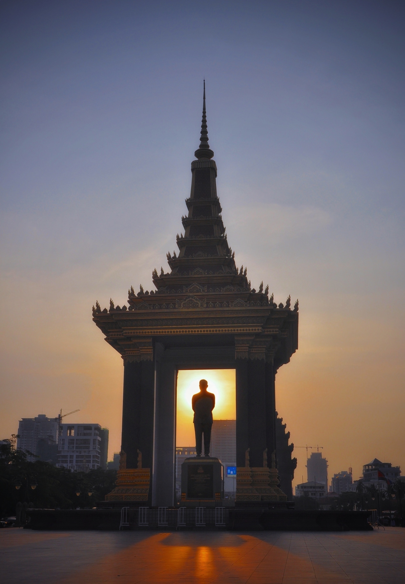 Sun setting behind the Statue of King Father Norodom Sihanouk