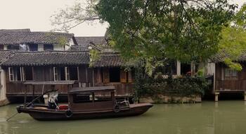 Wuzhen Water Town is a 1300 year old town in China's Zhejiang Province.  It is a tourist must-see if you are in the Hangzhou or Shanghai area, despite the large number of visitors each year, it is still a small town where people go about their lives every day.  