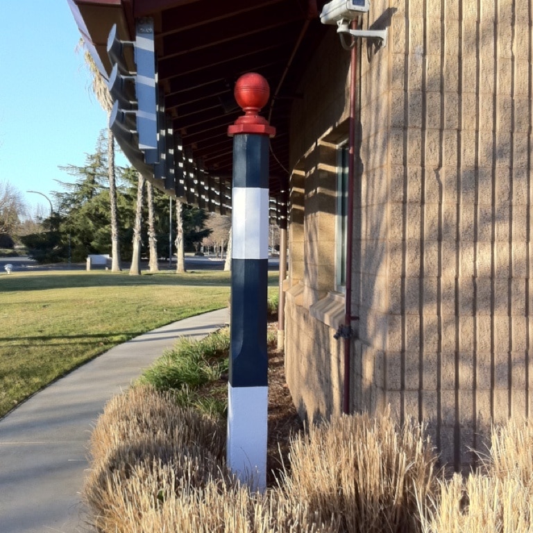 This is one of three furlong posts from the old Tanforan Race Track in San Mateo. Donated to UC Davis when the track was torn down. You'll have to find the plaque and read the rest. 