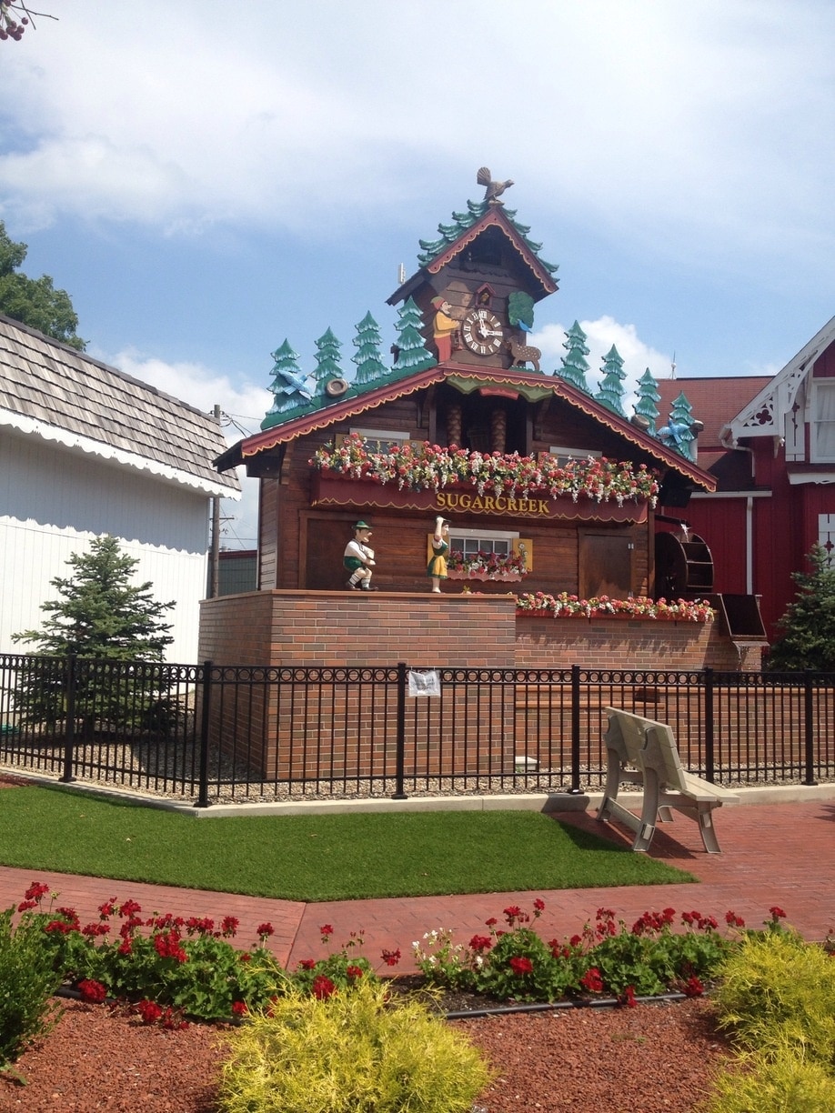 World's largest Cuckoo Clock in Sugar Creek, Ohio. When it chimes, little puppets come out one door and play a song, then go back in the other door.