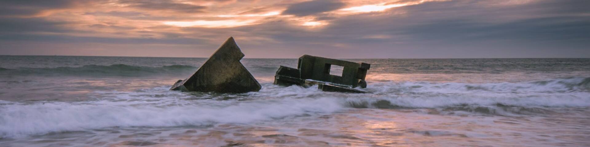 Some old Pillboxe's and anti tank defense's along the coast. Slowly fading into the sea.