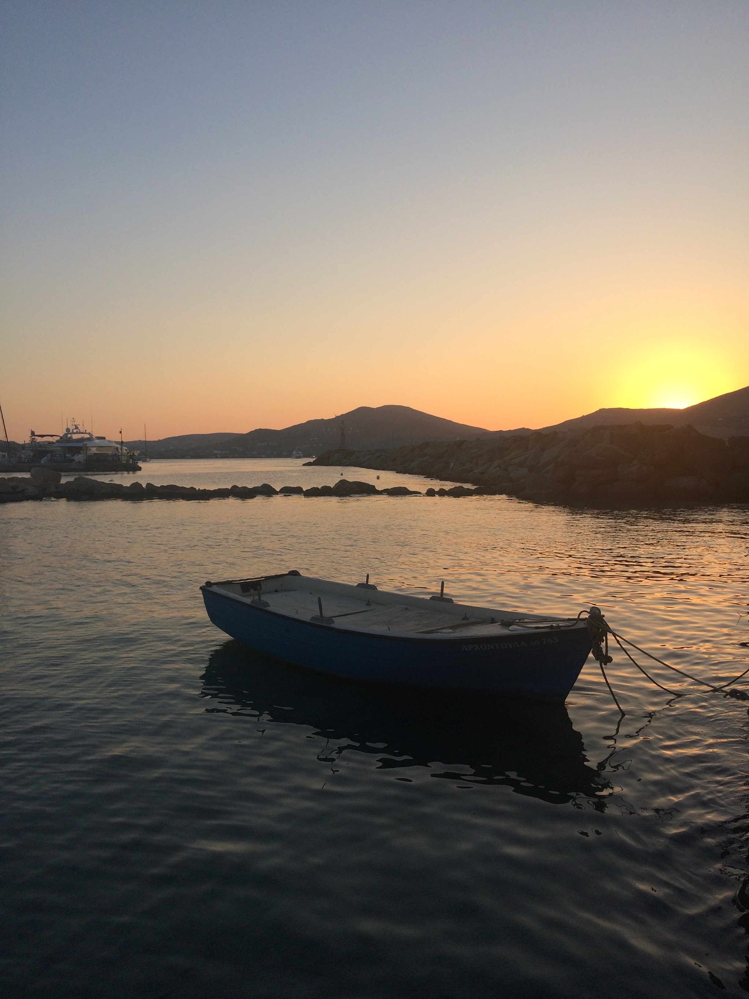 A lovely evening in the Greek island of Paros by the sea x