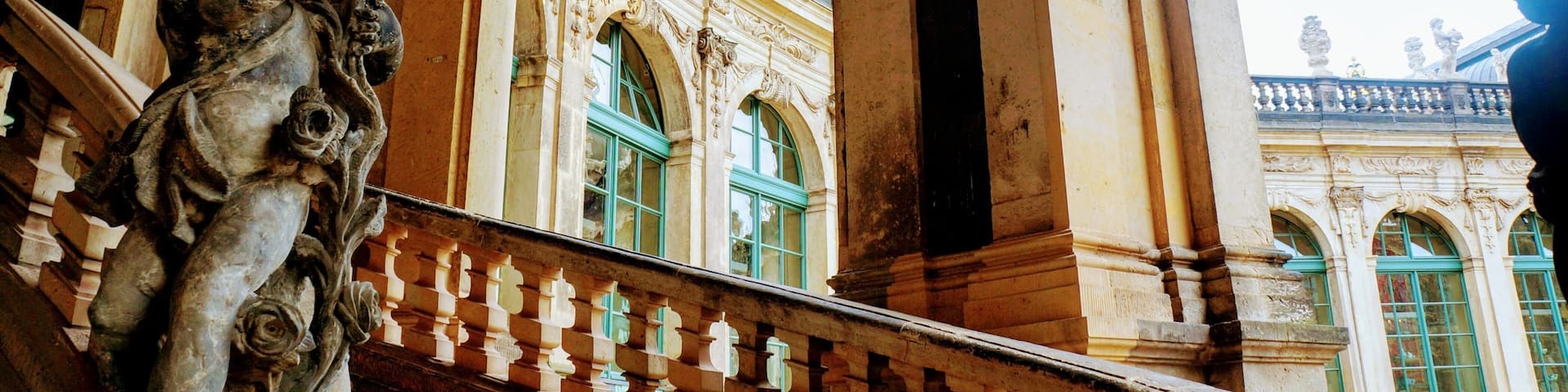 Only a stair, statue, a pillar and some windows. These lines however make my photograph the way i like it.