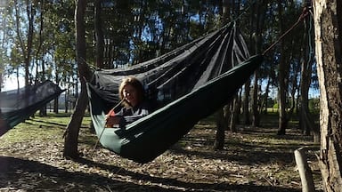 Camping out in our hammocks on the edge of Lake Eildon, Bonnie Doon Victoria.
This are aid popular for fishing and water sports, it is also somewhat 'famous' as being the place where the Aussie movie 'The Castle' was filmed. The holiday house used by the 'Kerrigan's' is just across the road a from our camping spot!