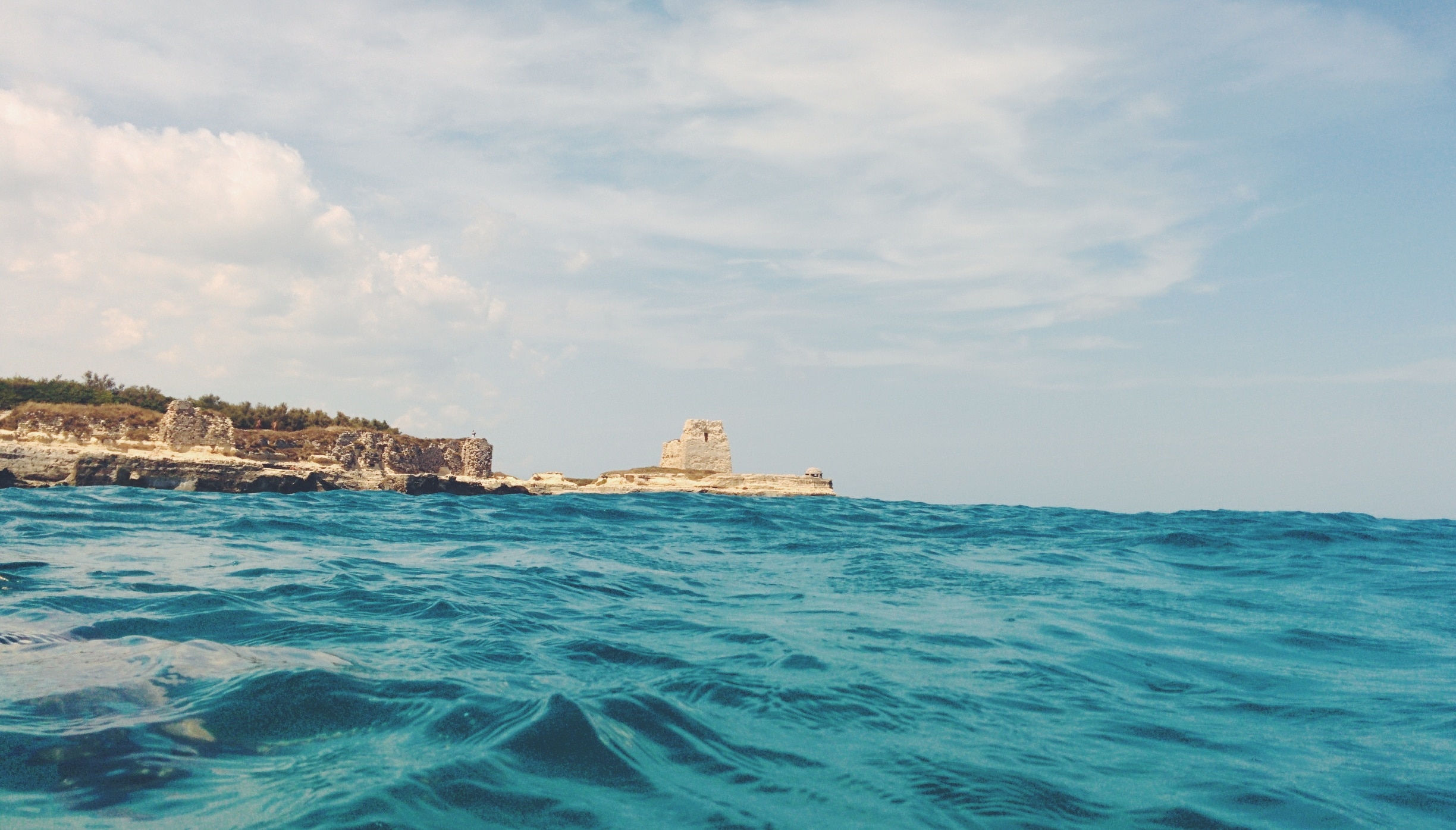 Direclty from the #water: a view of Roca Vecchia's tower! #colorful #sea #blue