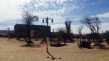 The main plaza of the deserted mining town Humberstone. About 30 minute bus ride from Iquique. Buses leave from Mercado centenario and cost 2000 pesos. They leave you right next to the town and you can spend hours and hours exploring the buildings and artifacts found in the town. Buses leave every 20 min.