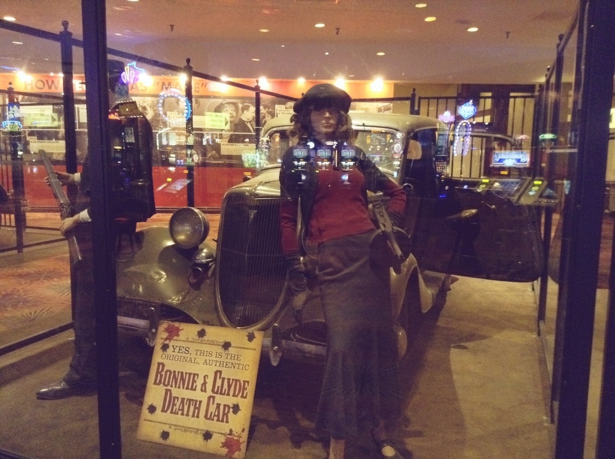 The REAL Bonnie and Clyde Death Car is on display in Primm, Nevada at Whiskey Pete's Hotel and Casino owned by Primm Valley Resorts. The casino is named after Whiskey Pete who was originally Pete MacIntyre, a gas station owner turned bootlegger who died in 1933. 

Info on http://www.weirdca.com/location.php?location=283
