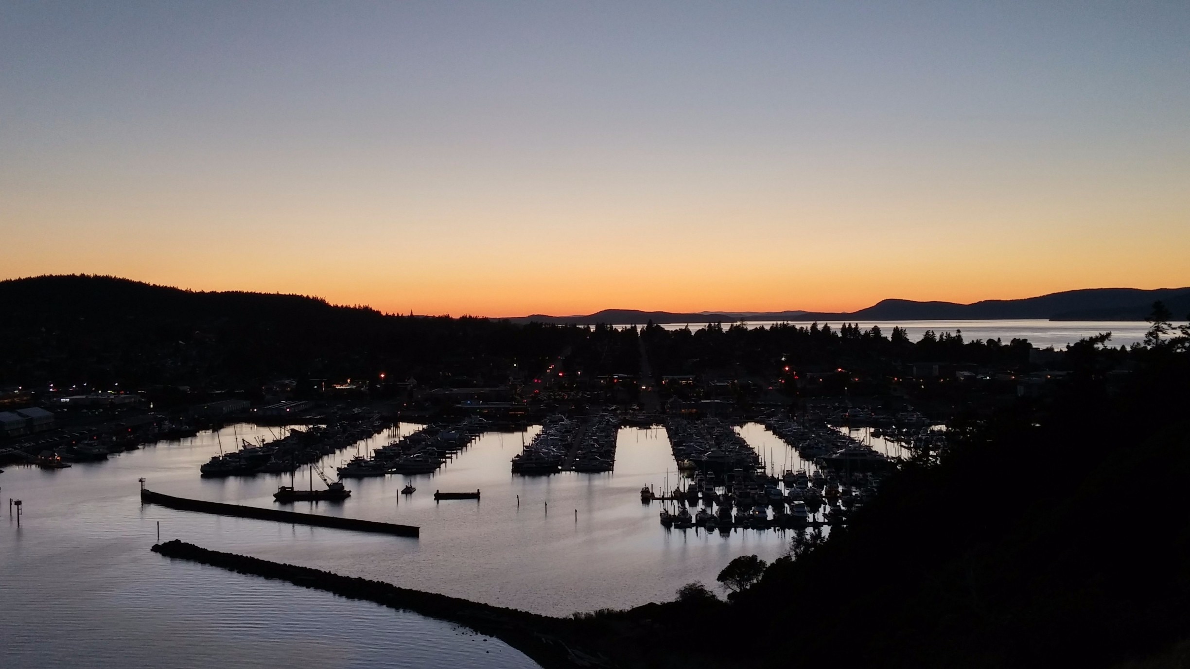 View from the top of Cap Sante Park looking west to Cap Sante Marina and the San Juan Islands in the distance. 

This is a very popular spot in Ancortes as it almost has a 360 degree view, which includes Mt. Baker, and on a clear day Mt. Rainier.
#sunset #weekendgetawayUSA