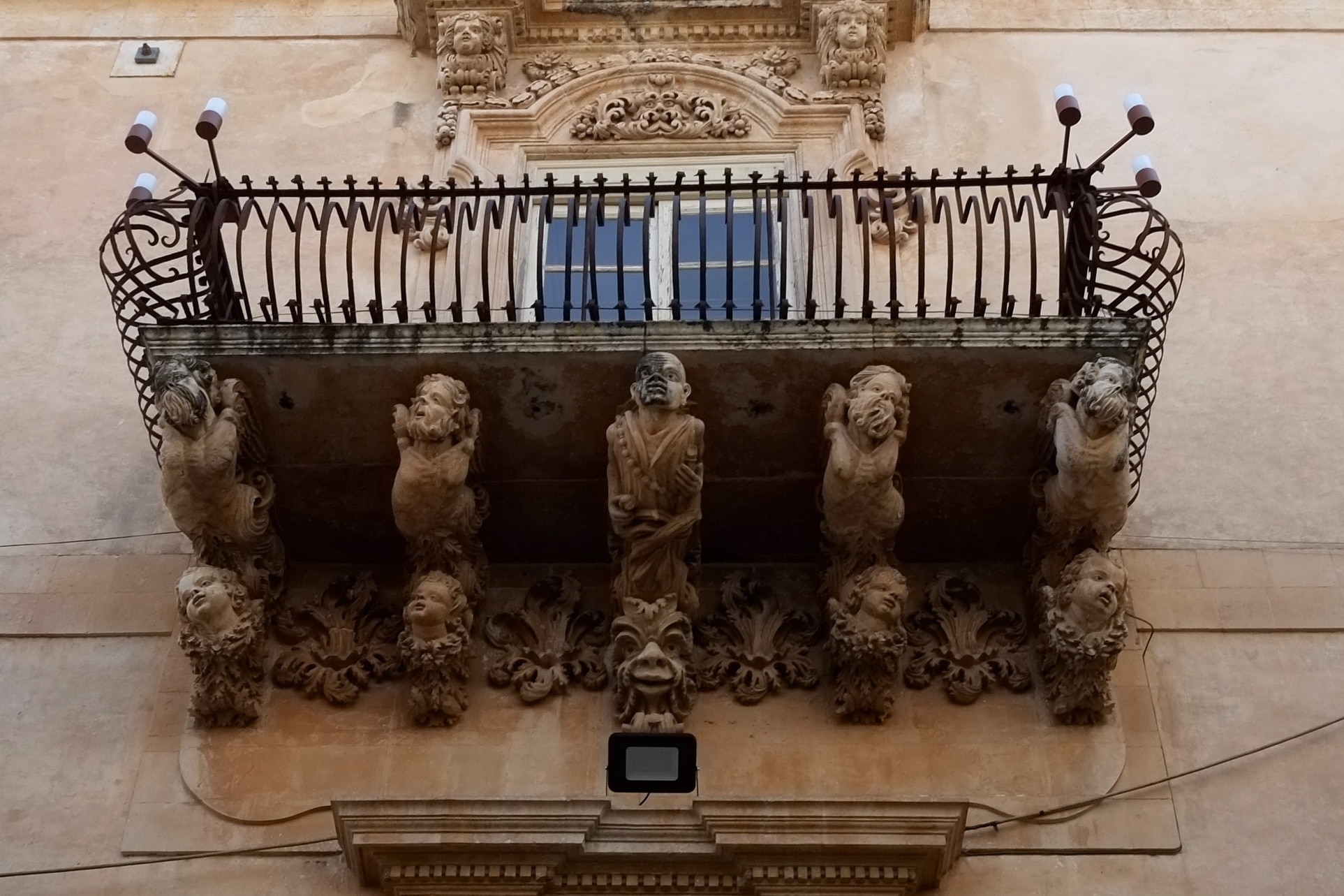 The striking facade of this 18th-century palace features wrought-iron balconies supported by a swirling pantomime of grotesque figures. Inside, the richly brocaded walls and frescoed ceilings offer an idea of the sumptuous lifestyle of Sicilian nobles, as brought to life in the Giuseppe Tomasi di Lampedusa novel Il Gattopardo