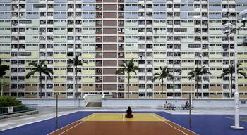 Hong Kong is one of the most densely populated places in the world. There are a loot of mass housing estates, some of them looking incredible from the outside