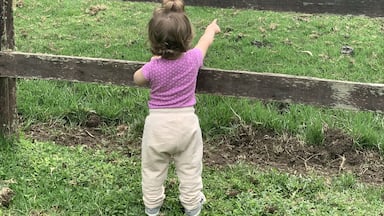 My little daughter on vacation at country side.