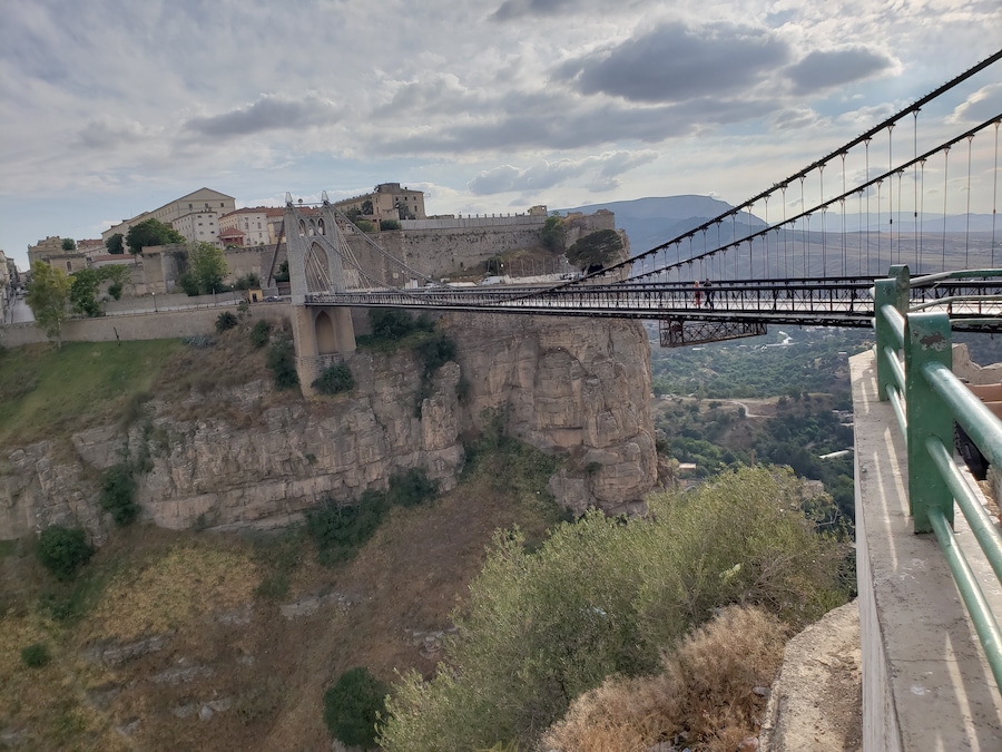 Sidi M'Cid Bridge is a 164 m long suspension bridge across the Rhummel River in Constantine, Algeria. It was opened to traffic in April 1912 and until 1929 was the highest bridge in the world at 175 m. The bridge was designed by French engineer Ferdinand Arnodin and links the Casbah to Sidi M'Cid hill.
#history