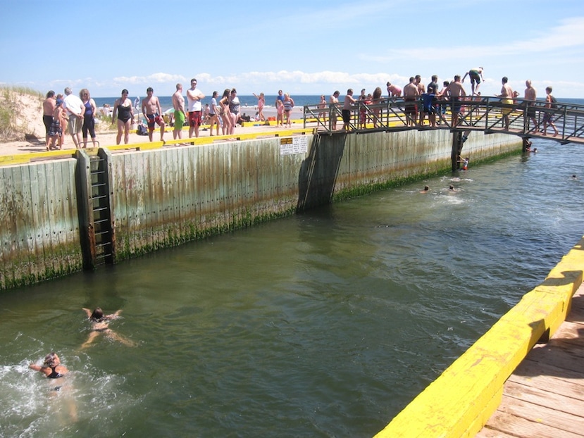 One of the best beaches on the island, Basin Head features "singing" sand, sandbars, and a popular bridge to jump off of (though signs note this is prohibited). #beachtips