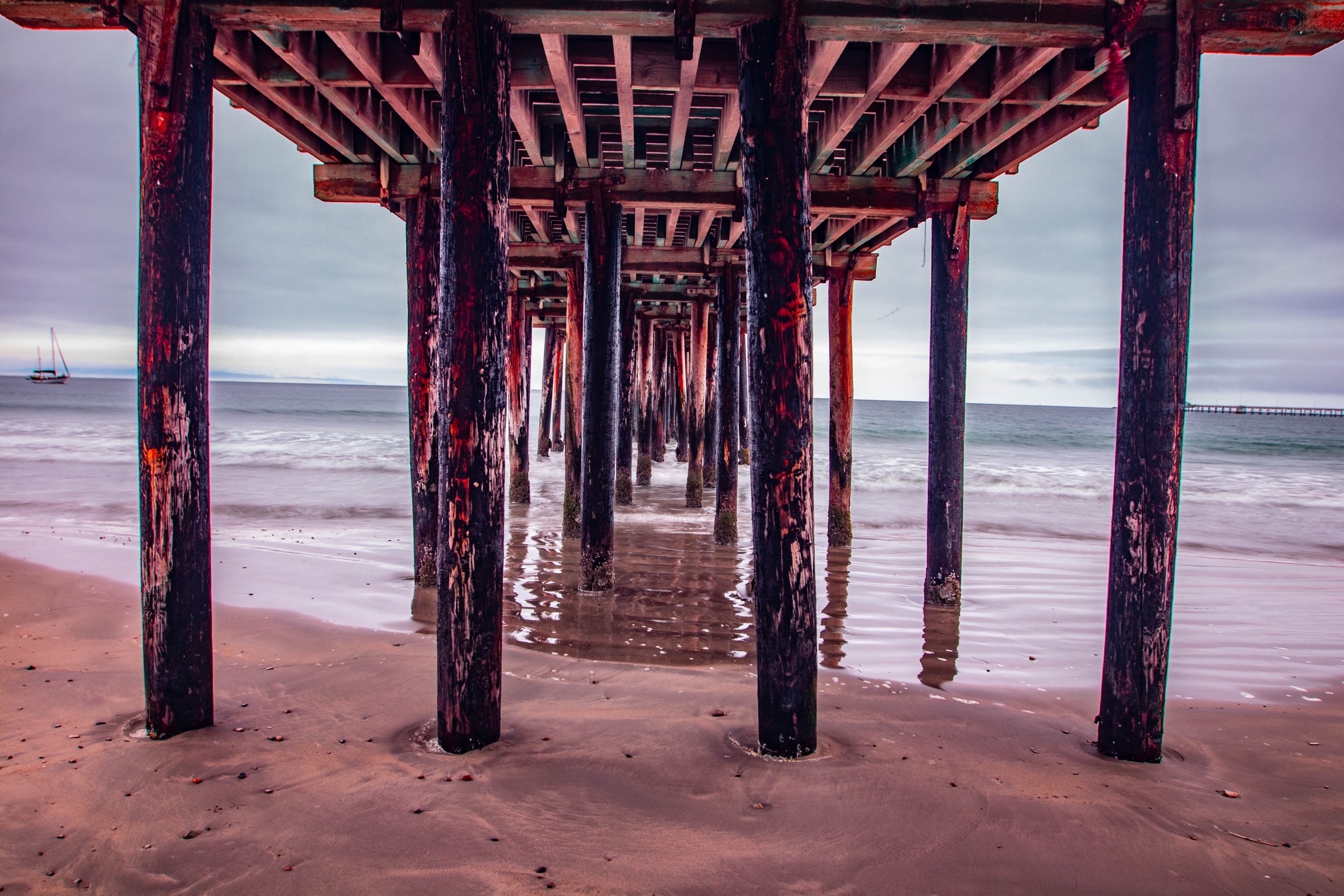 Mornings are pretty foggy here, but I was able to grab this photo under the pier on the beach. The pier helped cut the light so I could get a pretty good exposure. 