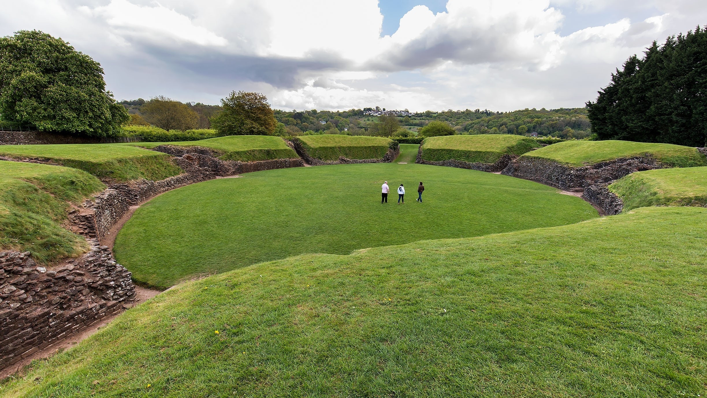 Well-preserved oval mound that once hosted gladiatorial combat and military processions. This amphitheater was built for the Roman forces at Isca around AD 90 and would have seated around 6000 spectators!