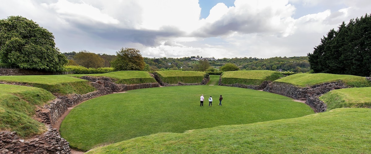 Well-preserved oval mound that once hosted gladiatorial combat and military processions. This amphitheater was built for the Roman forces at Isca around AD 90 and would have seated around 6000 spectators!