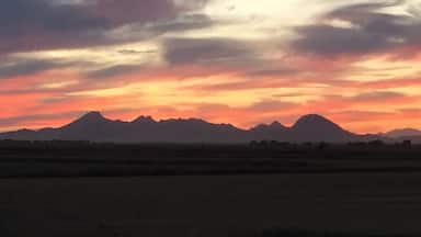 Sunset over my hometown Sutter Buttes, the smallest mountain range in the world.