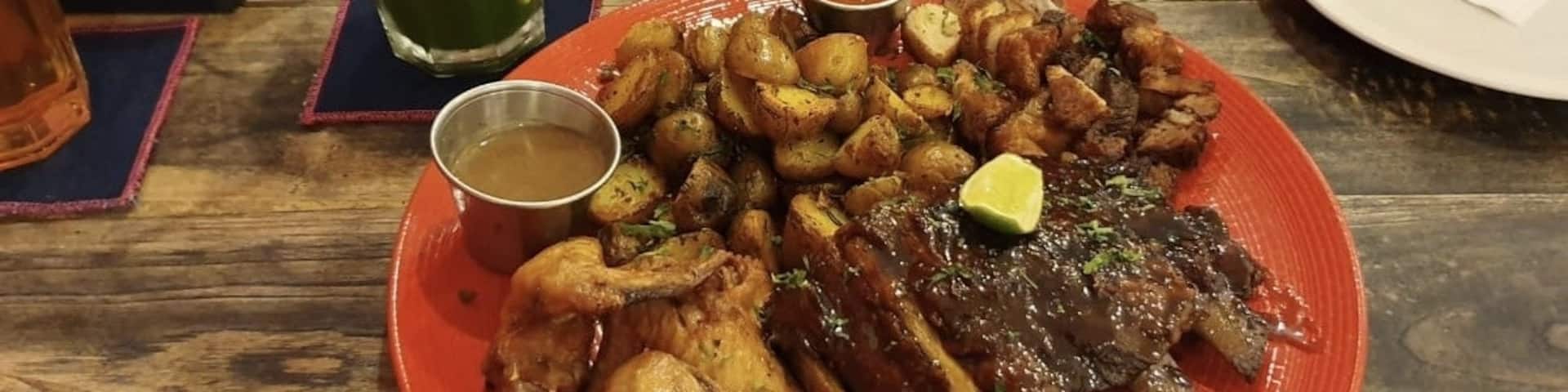 #porkstarplatter the best taste to enjoy #porkribs #chickenwing #porkbelly in one plate #Trovember Photo Contest #lifeatexpediagroup