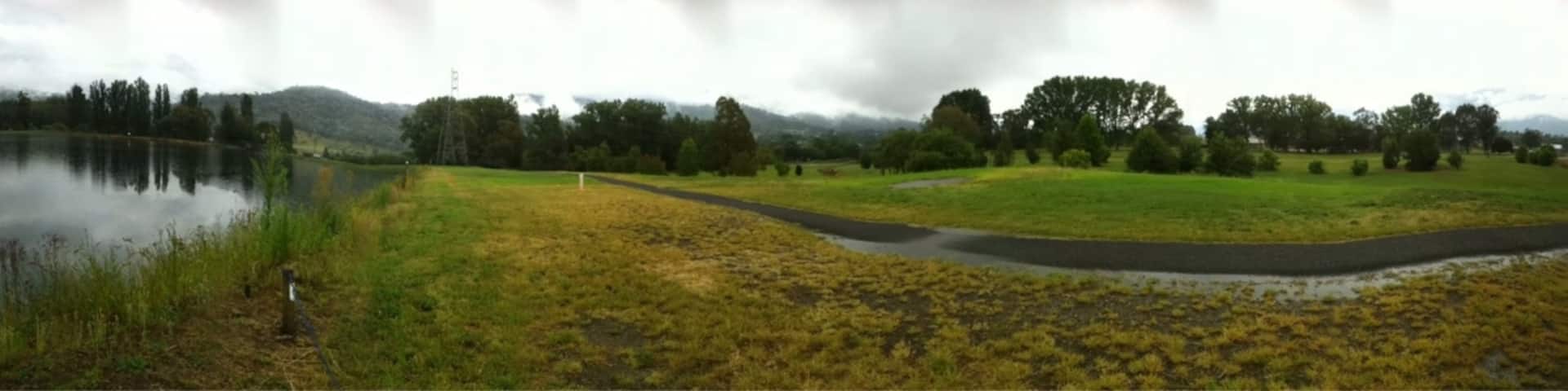 This is a man made pond age to regulate water flow into streams from the mountains.