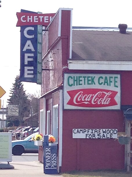 value: "On a recent getaway to Canoe Bay near the small town of Chetek, Wisconsin, we ate a German-themed lunch with homemade sausages and sauerkraut at the Chetek Cafe. Tasty! And a cool neon sign to boot."
