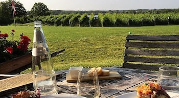 Oh, to dine in a vineyard.  This is Ravine Vineyard Estate Winery, where it's the summer of Chardonnay.  The meal is line caught ling cod with local veggies on mashed fingerling potatoes.  Sublime.  The Niagara wine region in Ontario makes for a great #delicious.
