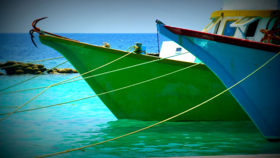 Boats in the harbor. Loved the colors in the Maldives - the water, the boats, and the clothing.