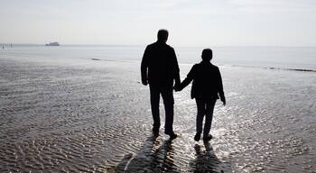 Wandering over Crosby Sands, Crosby, Merseyside, UK