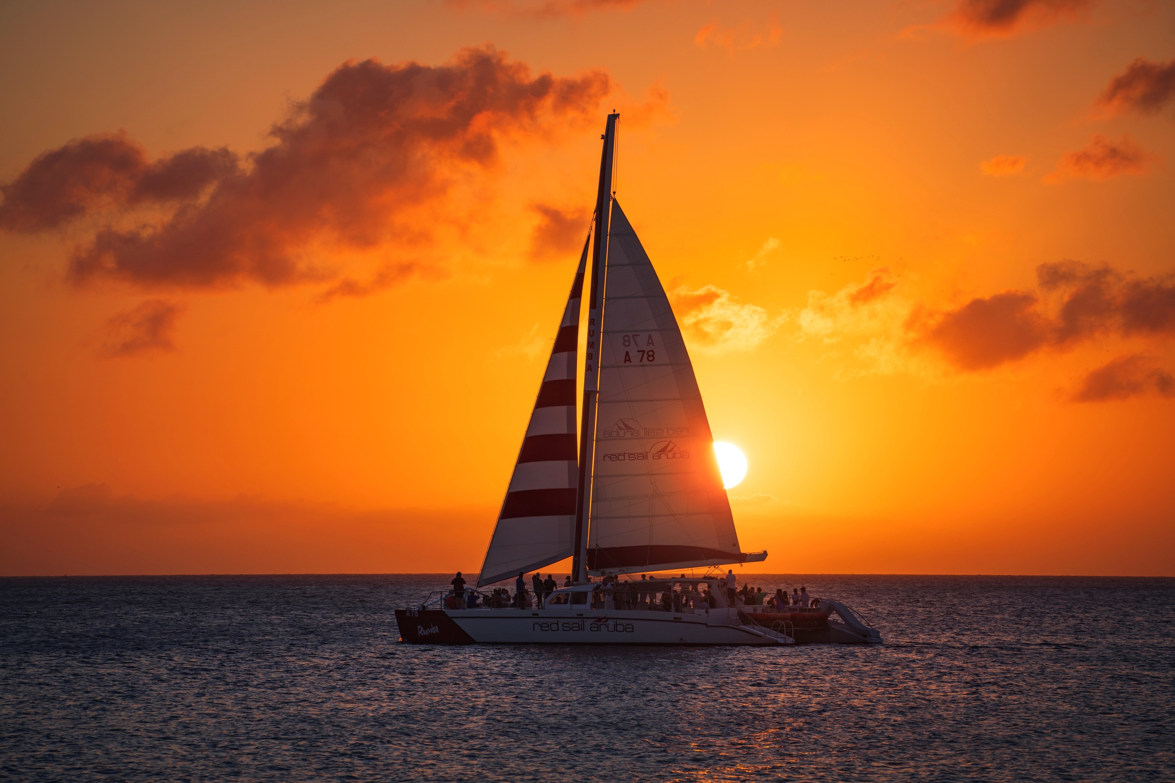 Watching the sailing boats glide across the water backlit by the setting sun at this rather low-key place on Aruba is an awesome way to end the day.