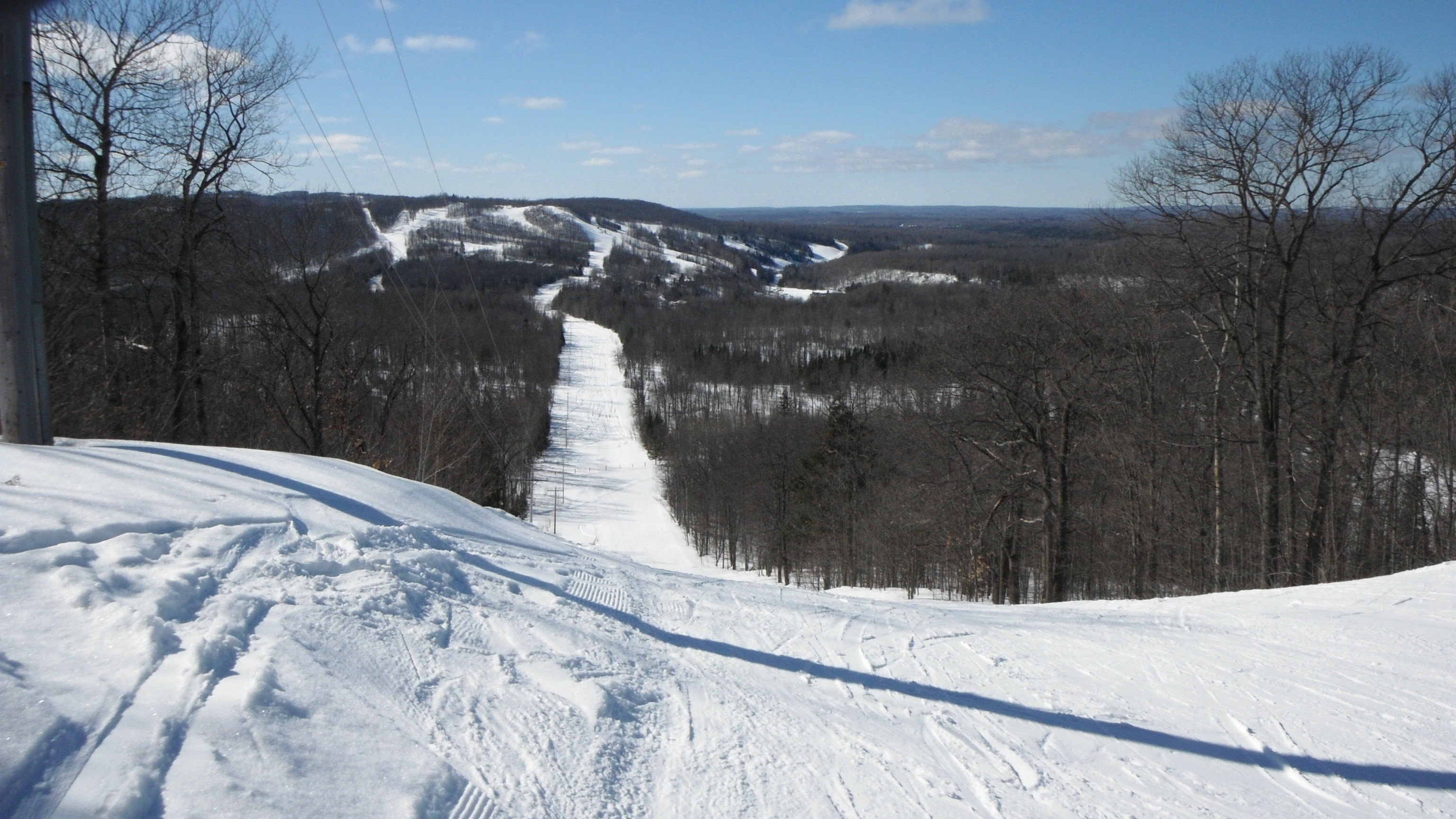 Skiing at Indianhead Mountain, MI looking towards Blackjack.  Lots of snow...and you can ski both places.