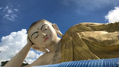Buddha in blue sky