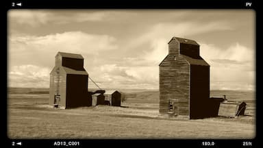 Old grain silos standing the tests of time for a railroad that no longer exists.