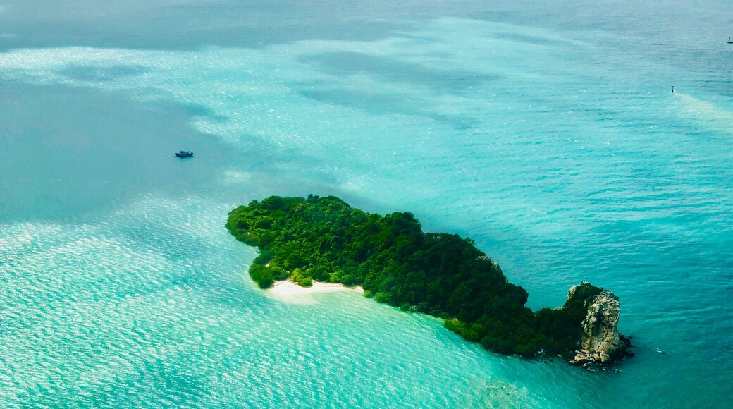 “A view from Heaven”

This is a photograph of Koh Samui group of islands taken from the Helicopter.

The clear water with turquoise shade is a visual treat to watch.

Looks like heaven.

#LifeAtExpedia
