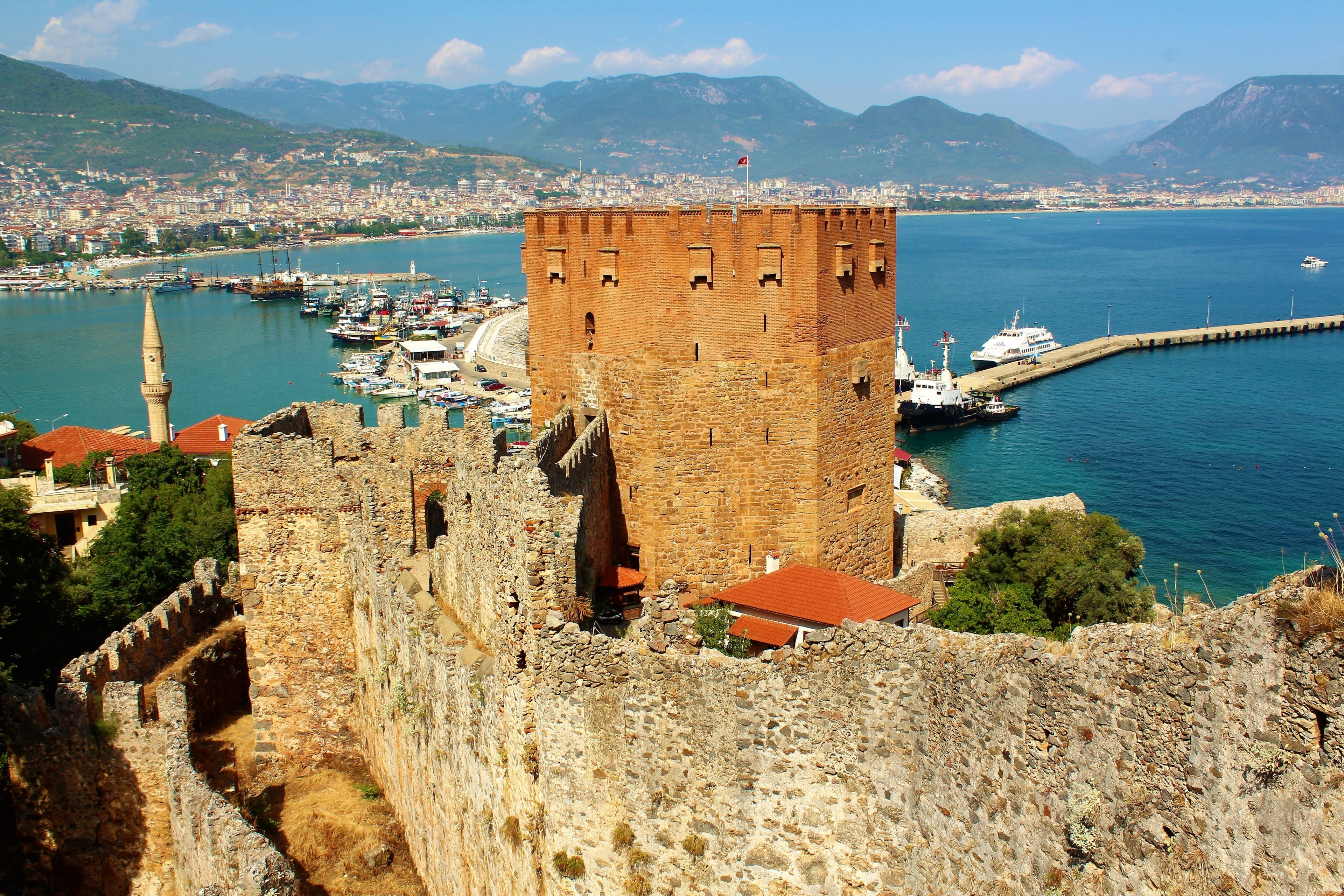 The Kızıl Kule (Red Tower) is a 13th-century tower in the Turkish city of Alanya. Part of Alanya Castle, the tower is considered to be the symbol of the city. And it's definitely one of the most impressive sights in Alanya :). One of my highlights of Summer 2018!

And more about the Red Tower: Being one of the unique examples of the medieval Mediterranean defense structure from 13th century, Red Tower was built by order of Alaeddin Keyqubad I, the Seljuk ruler, to Ebu Ali Reha el Kettani who was a master builder from Aleppo in order to protect harbor, shipyard and Alanya Castle against attacks from the sea. And the castle was built on the remnants of earlier Byzantine era and Roman era fortifications.